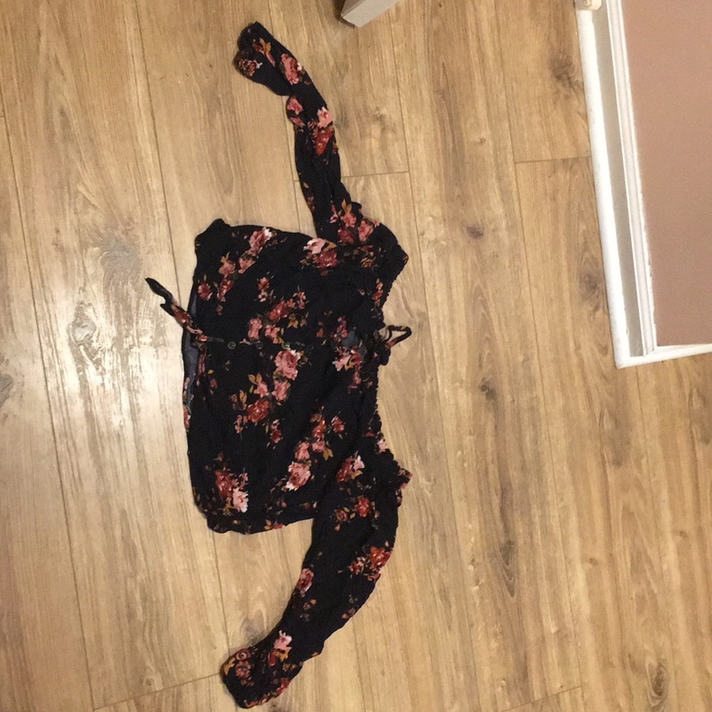 It is a crop top over the shoulders shirt